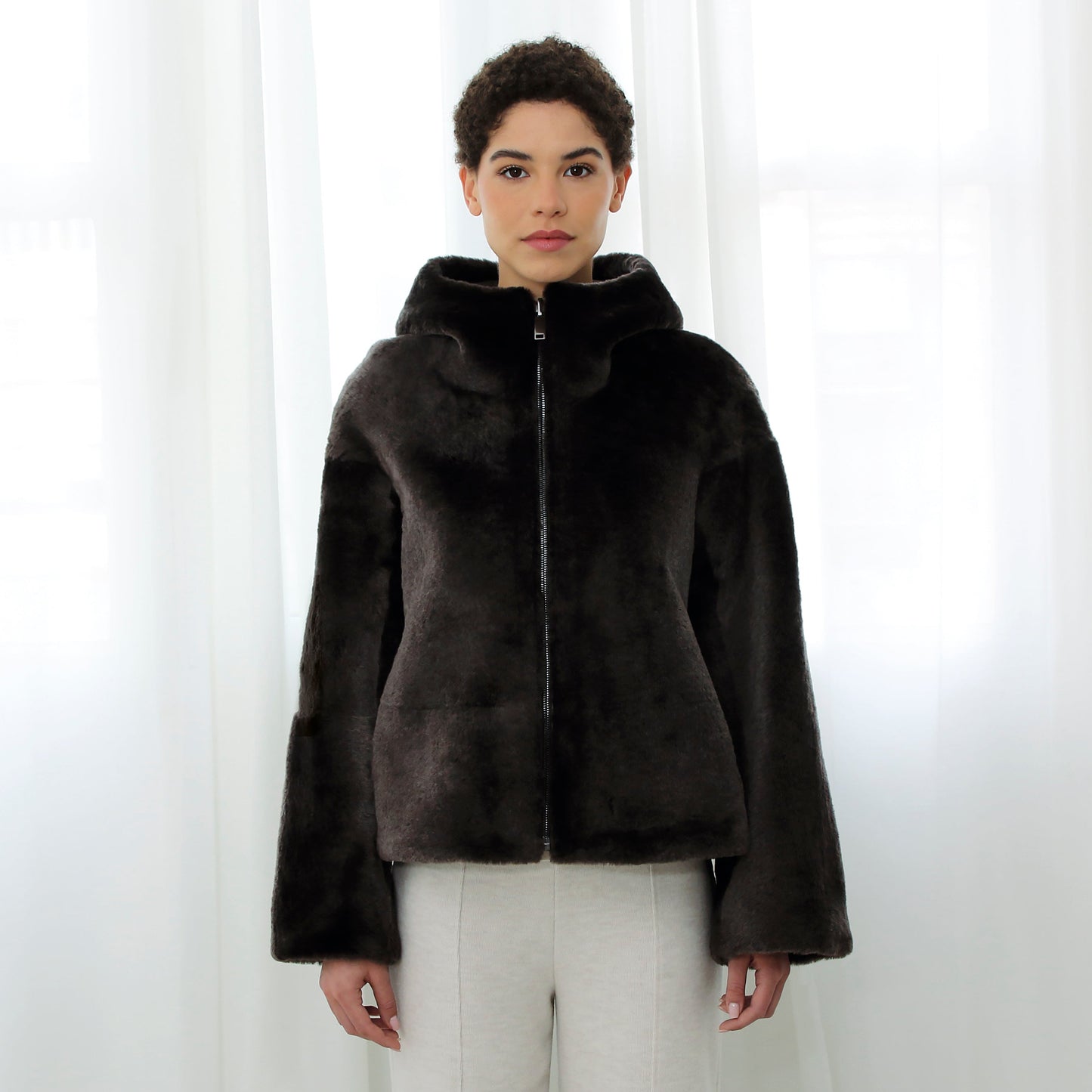 Rulamsjakke med hætte