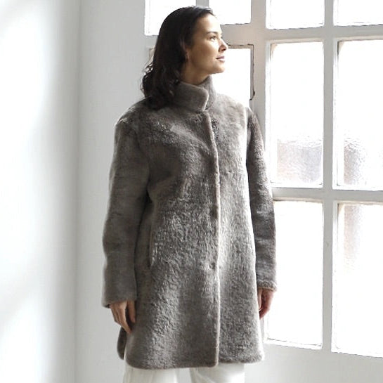 Rulamsfrakke med slids